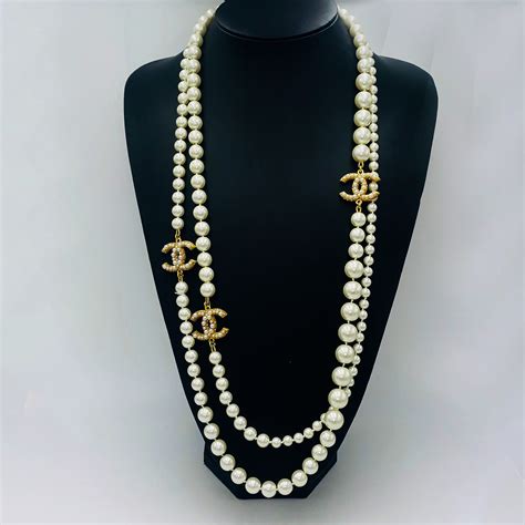 faux chanel long pearl necklace uk|chanel pearl long strand necklaces.